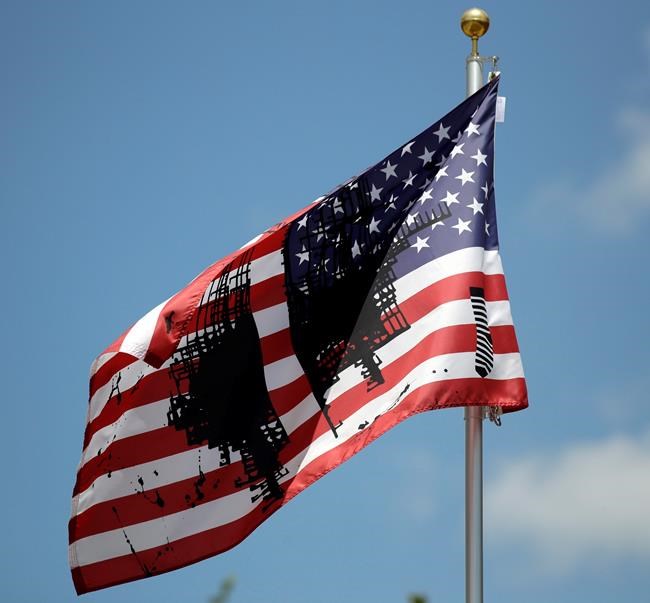 The Latest: University of Kansas says flag moved for safety | iNFOnews.ca