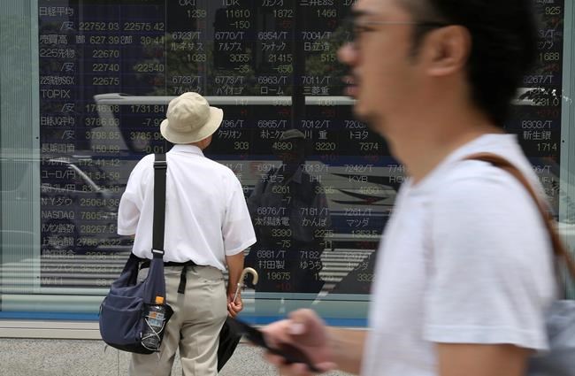 World markets mixed as traders await comment by Fed chair | iNFOnews.ca
