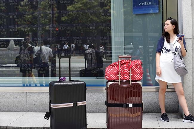 Asian shares mixed, investors wait after US shut for holiday | iNFOnews.ca