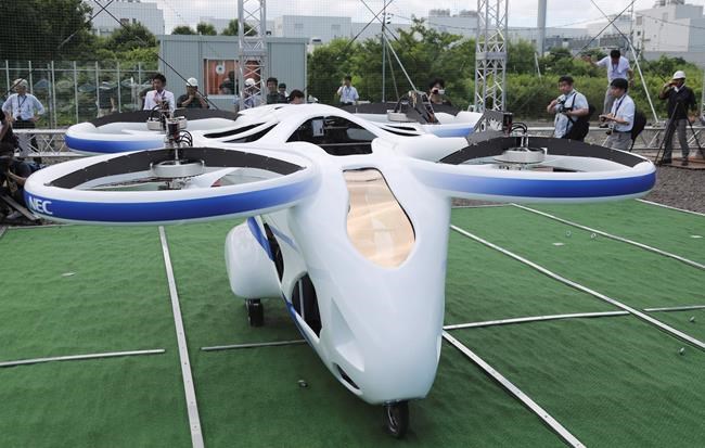 Japan's NEC shows 'flying car' hovering steadily for minute | iNFOnews.ca CP865897025