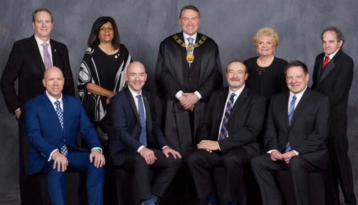 Formal photo of the Kelowna City Council.