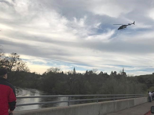 Man dies in swollen California river; girl missing | iNFOnews.ca