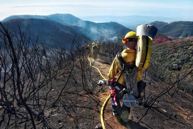 Latest: Firefighters brace for return of California winds | iNFOnews.ca CP999479217