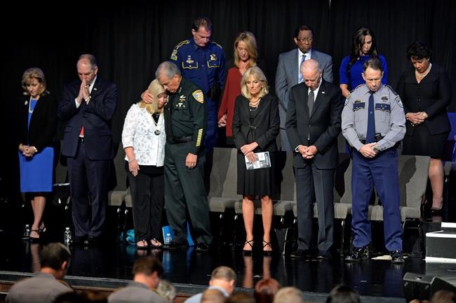 At vigil, Biden tries to comfort relatives of slain officers | iNFOnews.ca At vigil, Biden tries to comfort relatives of slain officers | iNFOnews.ca