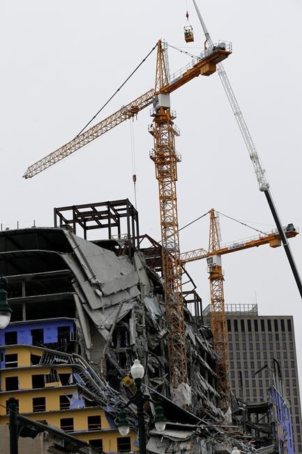 Controlled blasts to bring down cranes at collapse site | iNFOnews.ca Controlled blasts to bring down cranes at collapse site | iNFOnews.ca