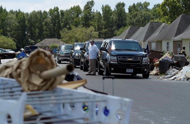 The Latest: Louisiana flood victim surprised by Obama visit | iNFOnews.ca