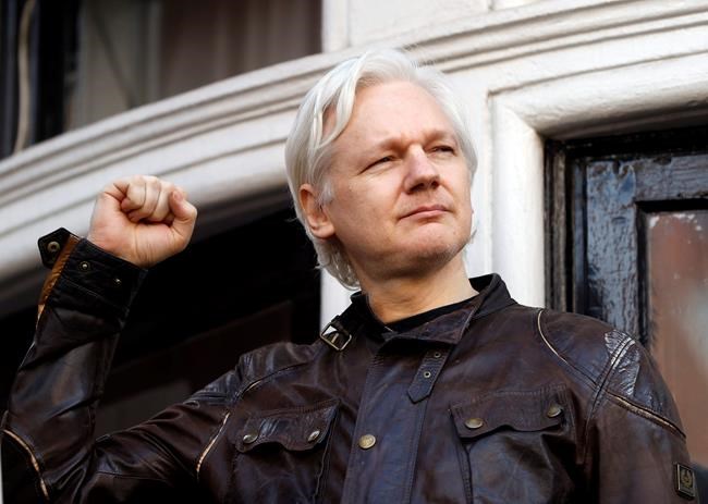 Report: Ecuador tells Assange to curb speech, look after cat | iNFOnews.ca CP1971160487