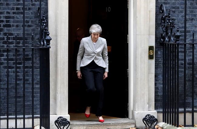 UK's May faces more criticism for post-Brexit ties text | iNFOnews.ca