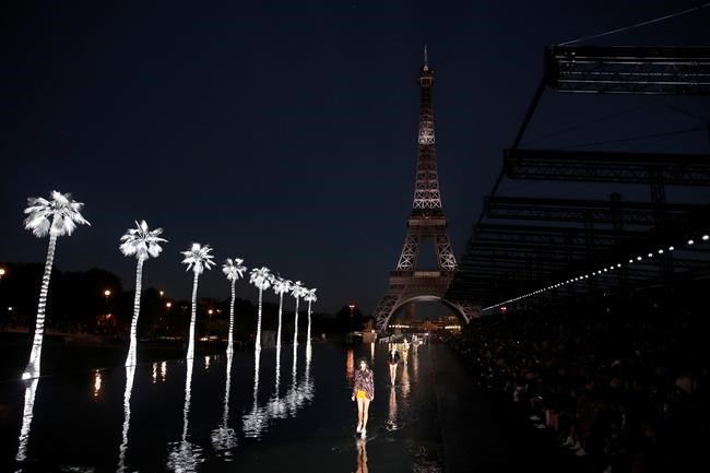 Starry Saint Laurent show in Paris sees models walk on water | iNFOnews.ca