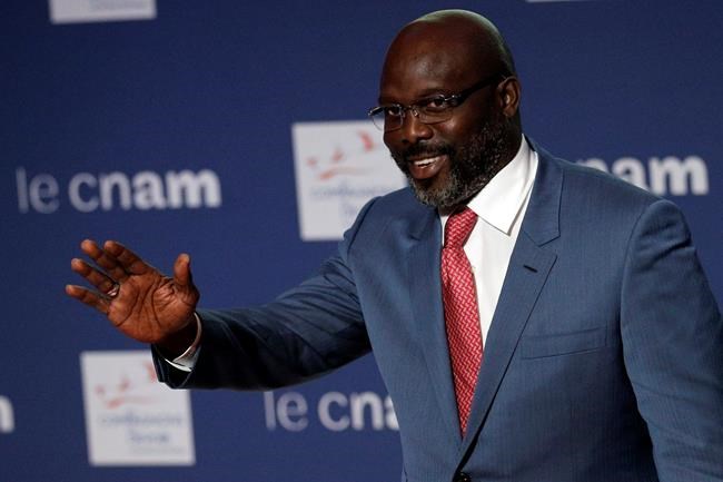 Liberia President Weah honours his former coach Wenger | iNFOnews.ca Liberia President Weah honours his former coach Wenger | iNFOnews.ca