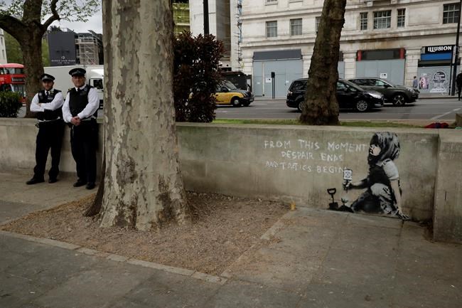 Climate mural emerges after London protests; Is it Banksy? | iNFOnews.ca