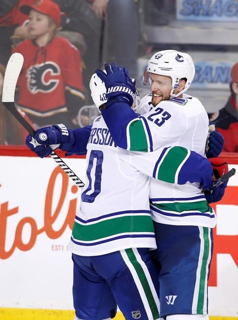 Alex Edler gives Vancouver Canucks big overtime win over Calgary Flames | iNFOnews.ca