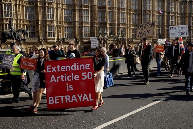 UK lawmakers vote to hold prime minister to Brexit promises | iNFOnews.ca