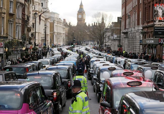 Uber loses license in London over safety, vows to appeal | iNFOnews.ca CP587871955