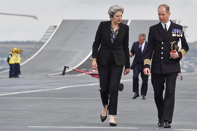 UK leader criticizes Trump remarks blaming "both sides" | iNFOnews.ca CP1120111530