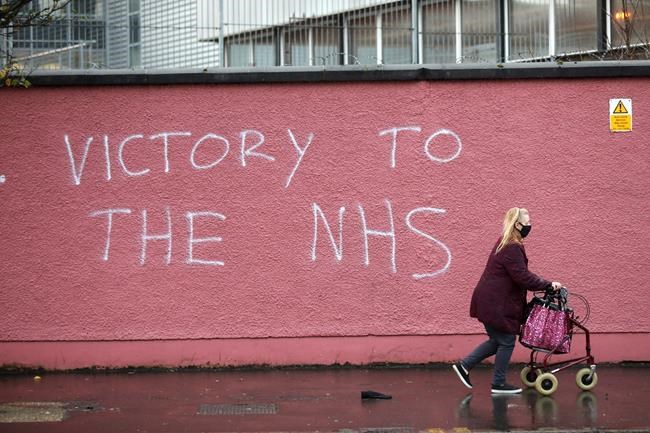UK to vaccinate out of pandemic by looking to local GPs | iNFOnews.ca CP449943455
