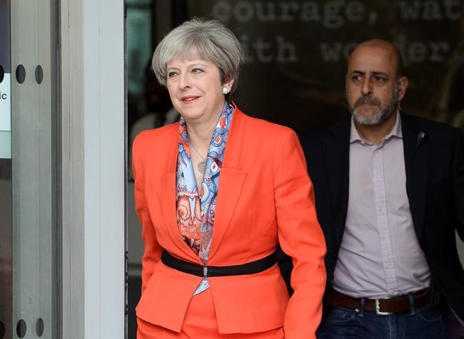 May brushes off EU calls to settle Brexit divorce bill first | iNFOnews.ca