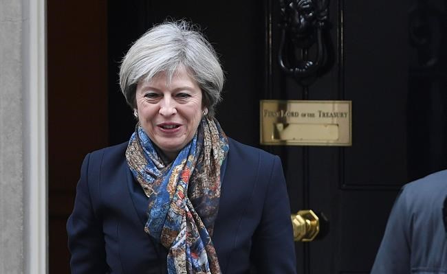 The Latest: May to reveal UK plans on Brexit in formal paper | iNFOnews.ca CP254562174