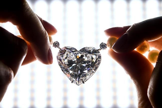 Heart-shaped diamond sells for $13M, under auction estimate | iNFOnews.ca Heart-shaped diamond sells for $13M, under auction estimate | iNFOnews.ca