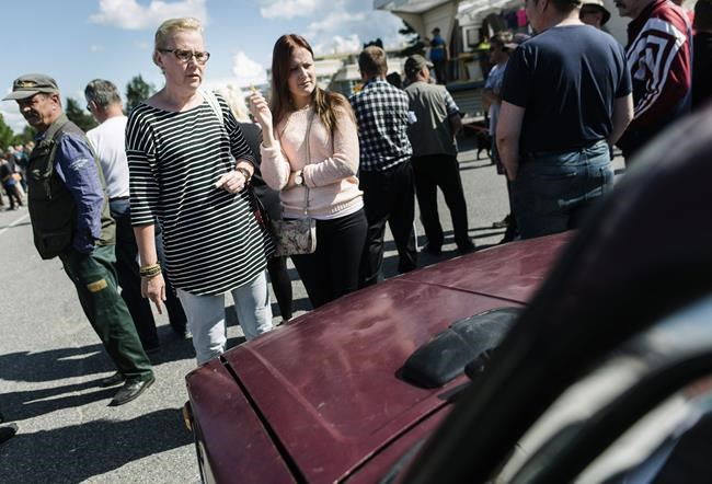 Finland holds auction for Soviet cars abandoned by migrants | iNFOnews.ca