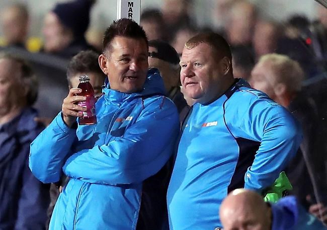 English soccer player banned for FA Cup pie-eating bet stunt | iNFOnews.ca
