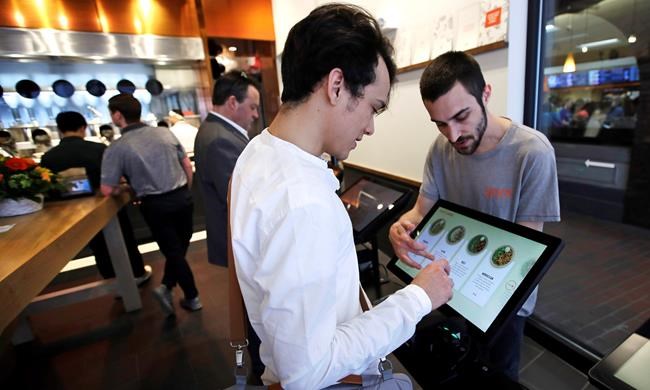 Robot fast-food chefs: Hype or a sign of industry change? | iNFOnews.ca CP1853370612