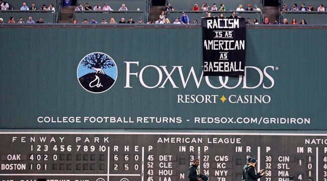 Racism banner gets fans removed from Fenway Park in Boston | iNFOnews.ca