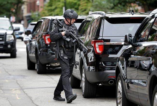 Boston officer shot, 3 suspects taken into custody | iNFOnews.ca