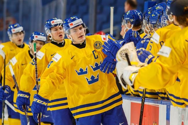 Sweden's captain throws silver medal into crowd after frustrating loss to Canada | iNFOnews.ca CP944820969