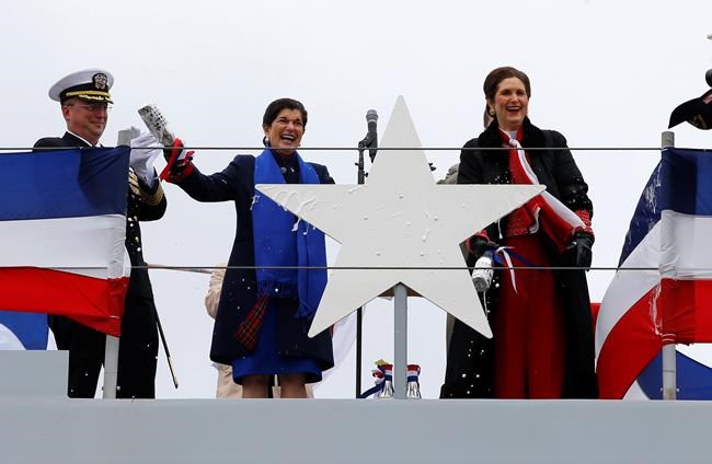 LBJ's daughters christen stealthy warship bearing his name | iNFOnews.ca