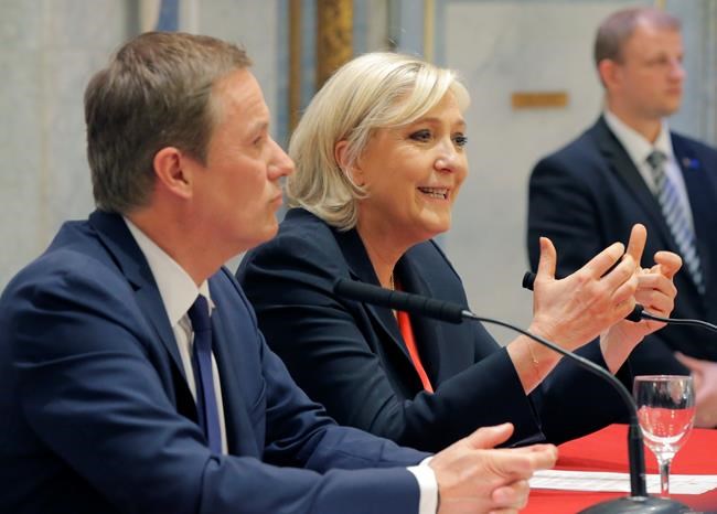 The Latest: Macron visits the Holocaust Memorial in Paris | iNFOnews.ca
