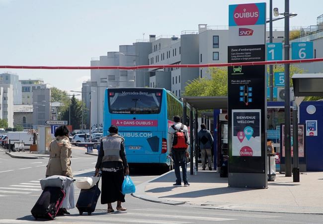 Macron buses highlight new French president's mixed legacy | iNFOnews.ca