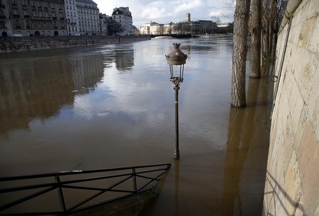 Rain-swollen Seine burst its banks, engulfs quays | iNFOnews.ca