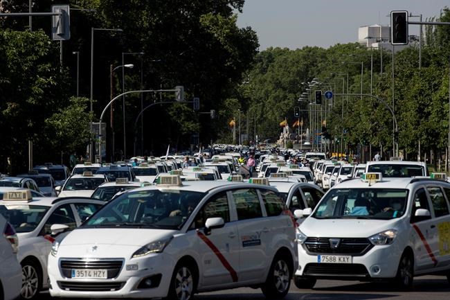 Cab drivers in Madrid protest amid low post-outbreak demand | iNFOnews.ca