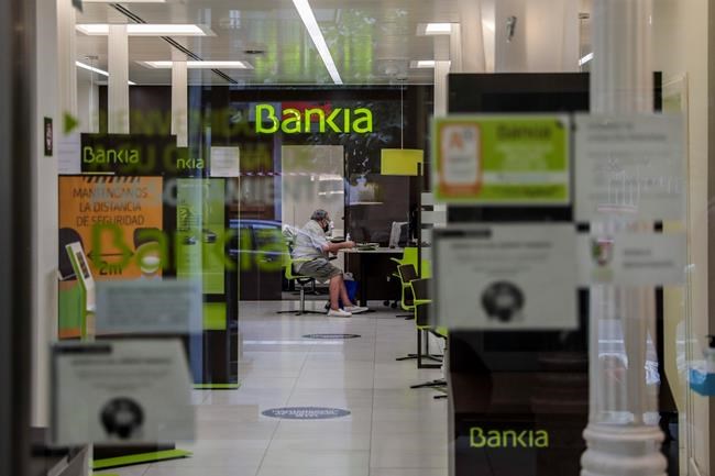Spanish banks merge in sign of hard economic times ahead | iNFOnews.ca Spanish banks merge in sign of hard economic times ahead | iNFOnews.ca