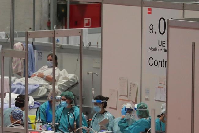 At Madrid field hospital, staff seeks to provide human touch | iNFOnews.ca