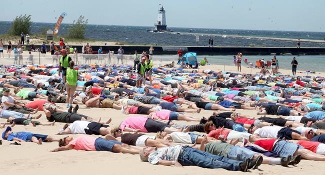 Western Michigan city breaks sand angel world record | iNFOnews.ca Western Michigan city breaks sand angel world record | iNFOnews.ca