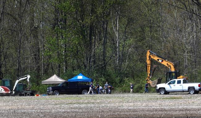 The Latest: Search for missing girls' remains ended for day | iNFOnews.ca CP28058624