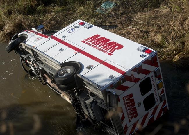1 dead after ambulance hits car, goes off Michigan bridge | iNFOnews.ca