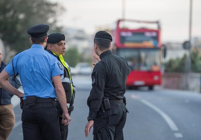 Double-decker tourist bus slams into tree in Malta, 2 dead | iNFOnews.ca CP242680329