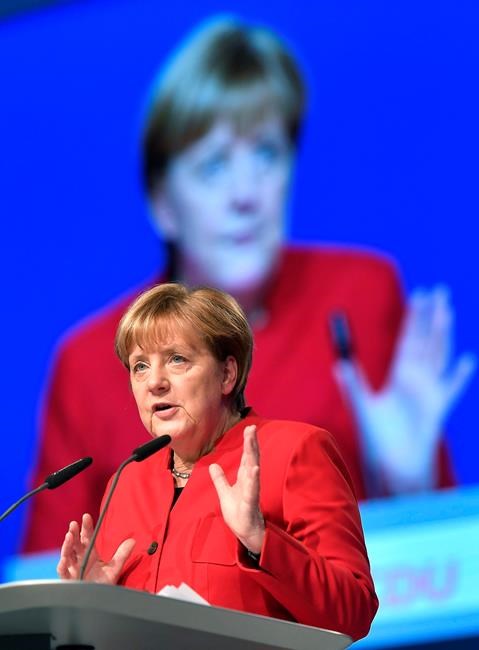 German conservatives back Merkel amid tough talk on migrants | iNFOnews.ca
