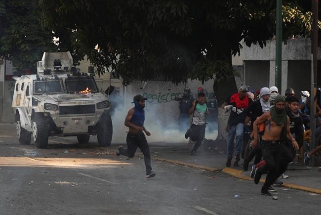 The Latest: More clashes in Venezuela's political crisis | iNFOnews.ca CP659638540