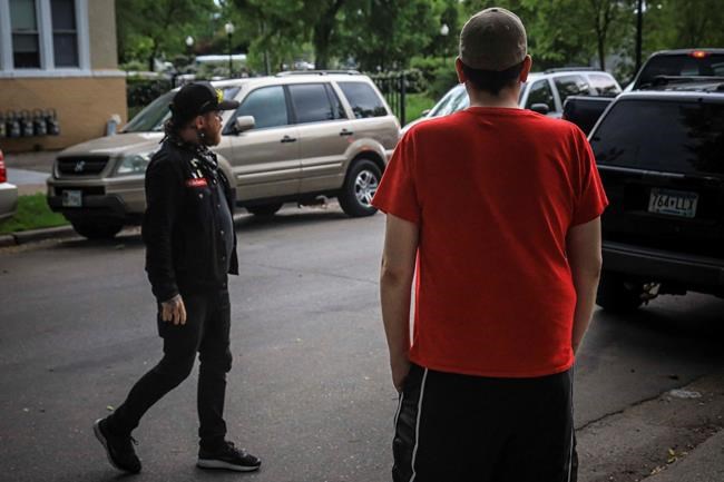 'Eyes are on you:' Minneapolis neighbours band to stand guard | iNFOnews.ca