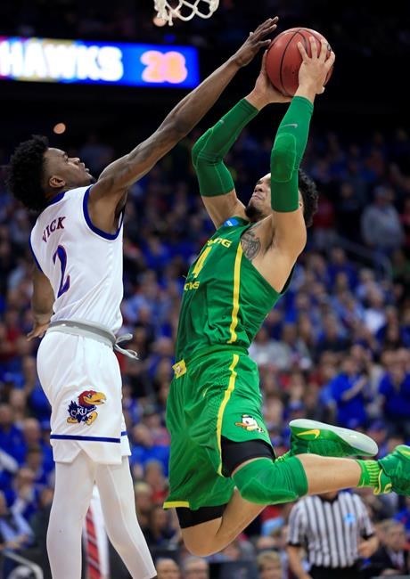 Oregon beats Kansas 74-60 to punch Final Four ticket | iNFOnews.ca