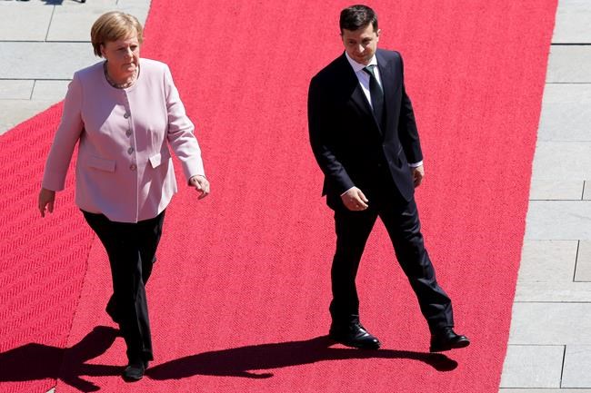 The Latest: Germany's Merkel blames dehydration for shaking | iNFOnews.ca