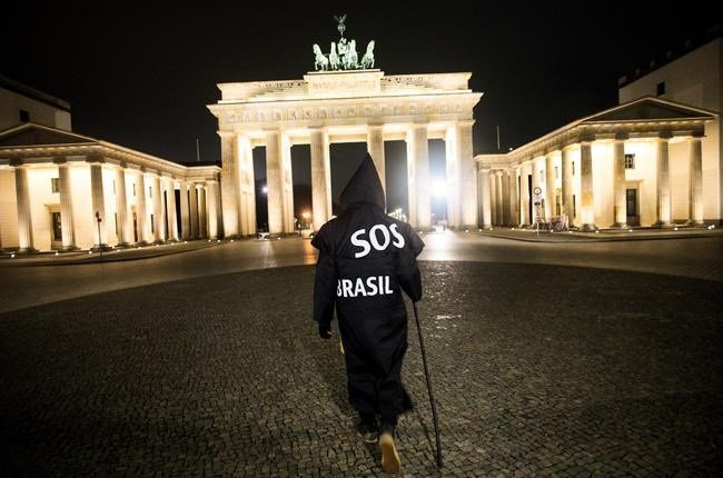 'Grim reaper' Berlin artist protests Brazil's virus stance | iNFOnews.ca 'Grim reaper' Berlin artist protests Brazil's virus stance | iNFOnews.ca