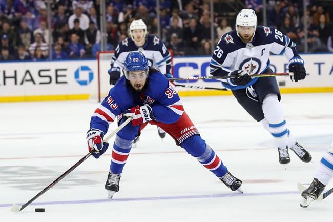 Howden scores late as Rangers beat Jets 6-4 in wild opener | iNFOnews.ca