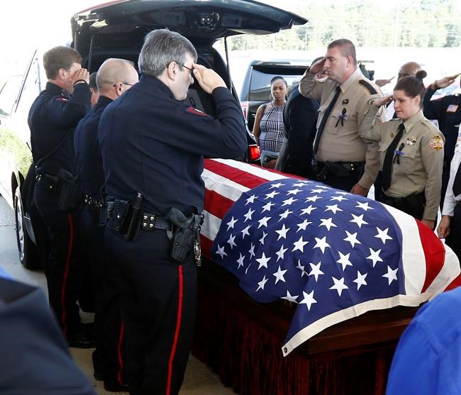 The Latest: Funeral held for slain Mississippi trooper | iNFOnews.ca