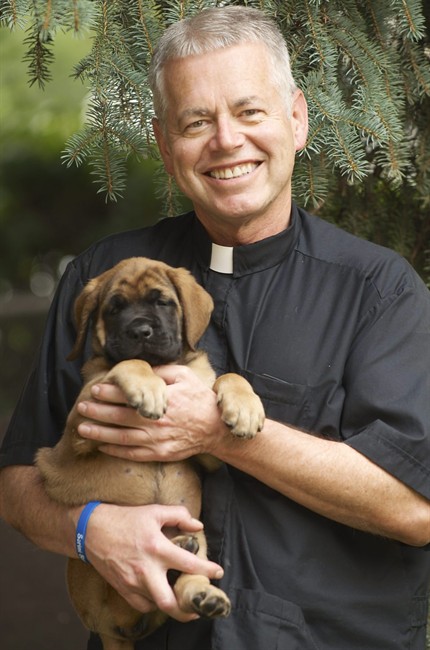 Officers rescue Montana priest's puppy found stuck inside 30-foot drain pipe | iNFOnews.ca Officers rescue Montana priest's puppy found stuck inside 30-foot drain pipe | iNFOnews.ca