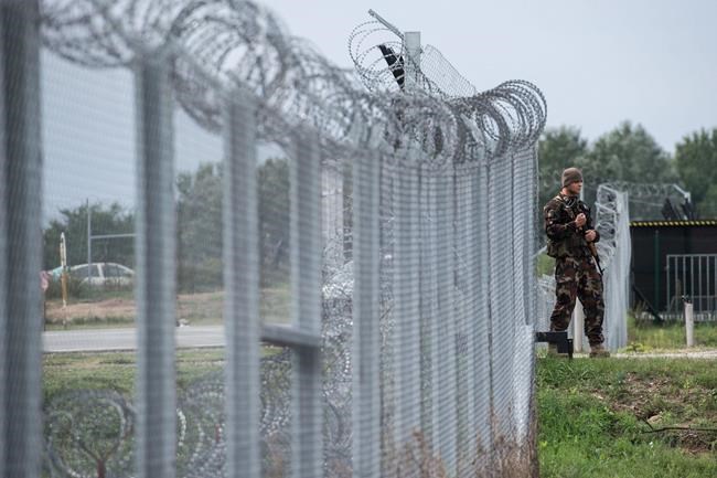 Hungarian inmates working around the clock on border fence | iNFOnews.ca Hungarian inmates working around the clock on border fence | iNFOnews.ca